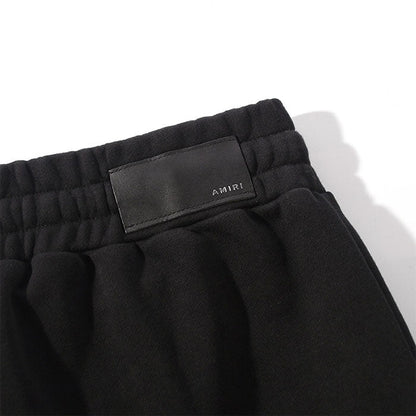 AMIRI Zoltar Tapered Logo-Print Cotton-Jersey Sweatpants
