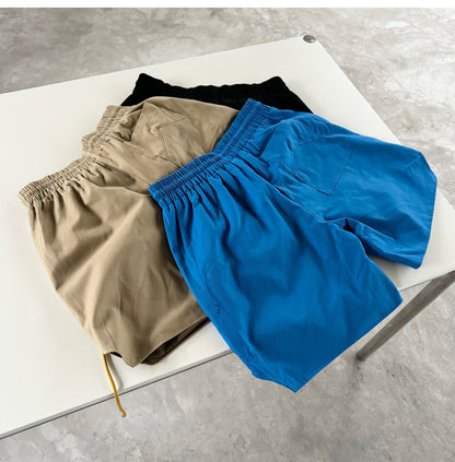 RHUDE logo-print drawstring swim Shorts